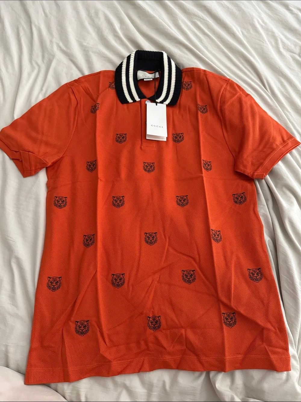 Gucci Men's Orange Polo with Black Tiger Motif & Striped Collar
